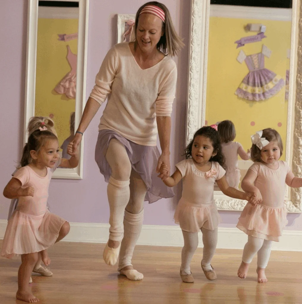 ballet teacher dancing with kids